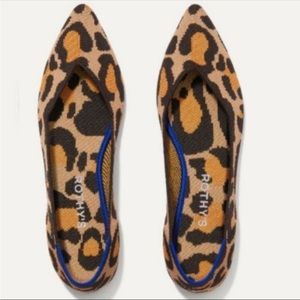 Rothy’s animal print pointed toe flats in big cat